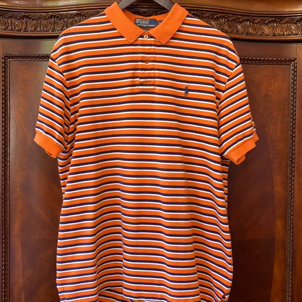 Polo by Ralph Lauren shirt is size Large. Orange with navy and white stripes.